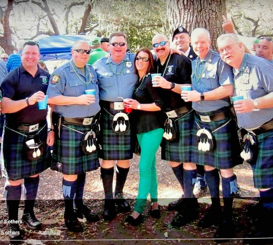 Cece Williams celebrates St. Patrick's Day with her boys, the men of the Rockland County (NY) Police Emerald Society Pipes and Drums Band