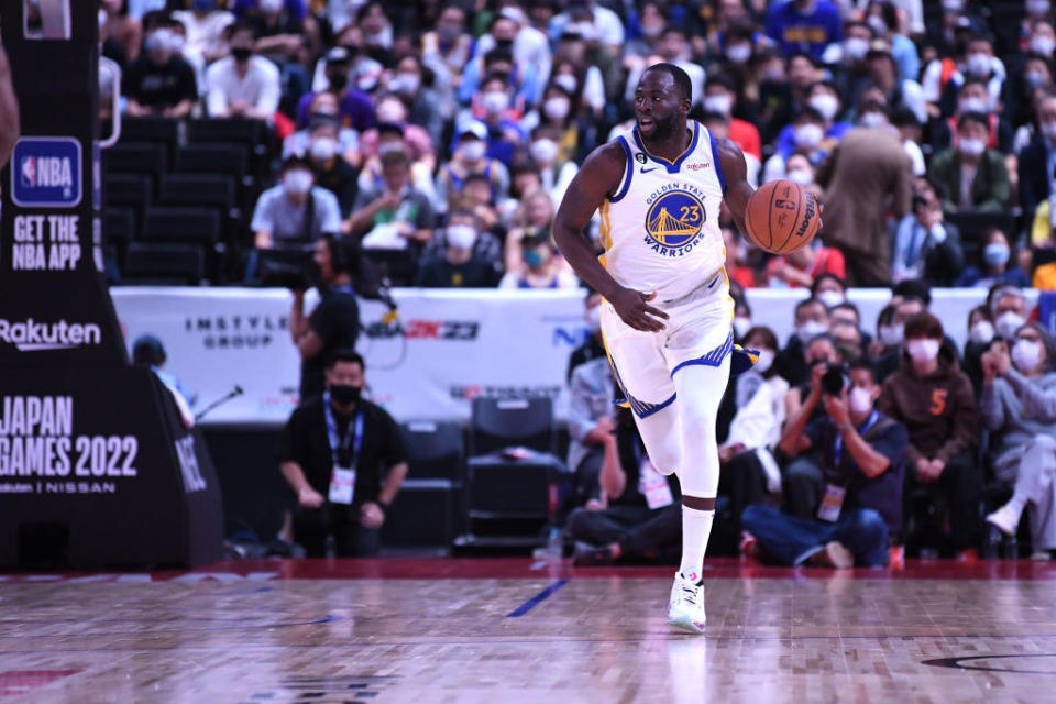 Draymond Green #23 of the Golden State Warriors dribbles the ball