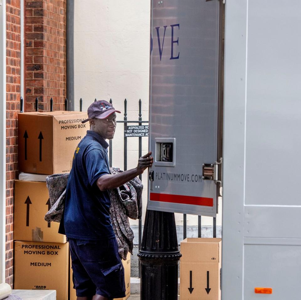 Removal workers in Downing Street on Monday - Julian Simmonds for The Telegraph