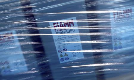 FIAMM battery stacks are packed and assembled in this photo illustration taken at the battery maker's factory in Avezzano, near L'Aquila, November 28, 2014. REUTERS/Alessandro Bianchi