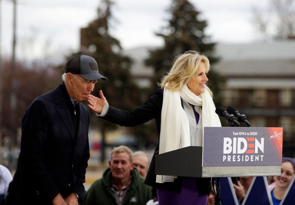 Joe Biden bites Jill Biden's finger at a campaign stop in Iowa in 2019.