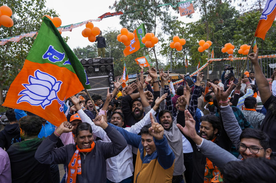 Supporters of India's ruling Bharatiya Janata Party, or BJP, celebrate early leads for the party in Rajasthan state elections in Jaipur, India, Sunday, Dec.3, 2023. Vote counting began Sunday in four Indian states in a test of strength for India's opposition pitted against the ruling party of Prime Minister Narendra Modi ahead of next year's crucial national vote. (AP Photo/Deepak Sharma)