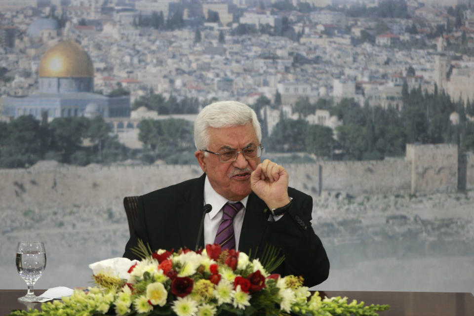 Palestinian President Mahmoud Abbas speaks during a meeting at his compound in the West Bank city of Ramallah, Saturday, Jan. 11, 2014. (AP Photo/Majdi Mohammed)