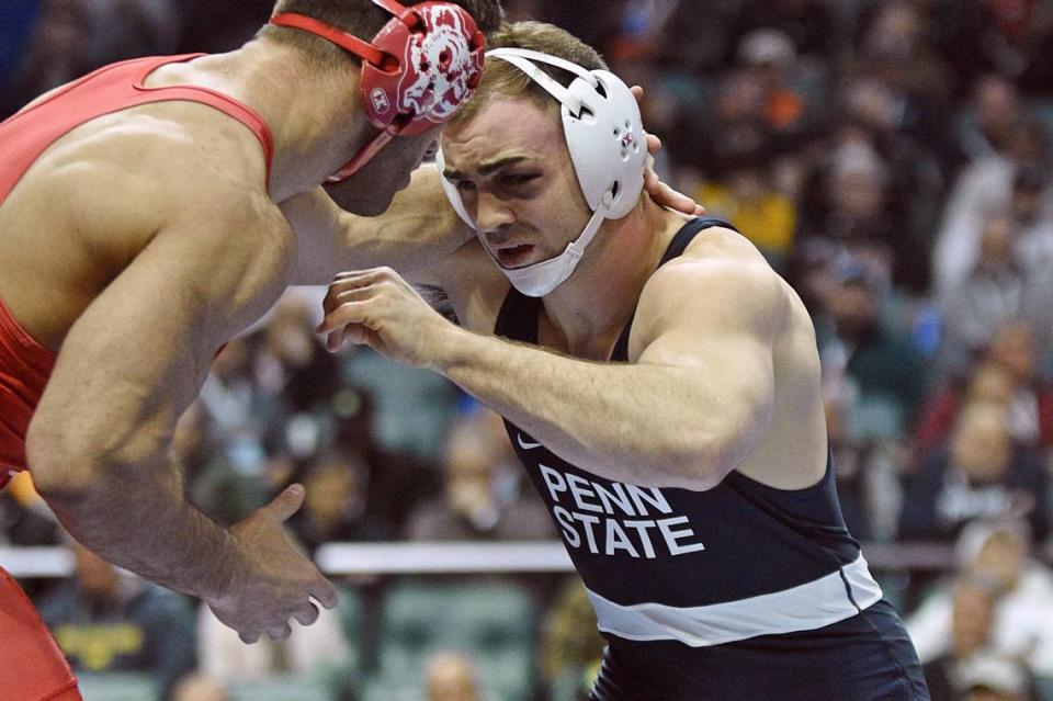 Penn State’s Max Dean looks for an opening on Cornell’s Jacob Cardenas in their 197-pound seventh place match of the NCAA Championships on Saturday, March 18, 2023 at the BOK Center in Tulsa, Okla. Dean defeated Cardenas, 4-2, to finish seventh.