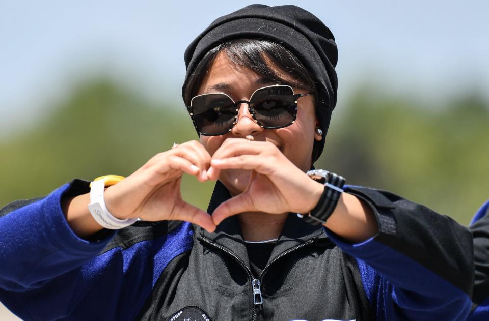 Axiom-2 Mission Specialist Rayyanah Barnawi, flashes a heart sign at family after the crew’s arrival at Kennedy Space Center Sunday, May 21, 2023. The second all-private crewed mission to the International Space Station scheduled to liftoff at 5:37pm EDT. Credit: Craig Bailey/FLORIDA TODAY via USA TODAY NETWORK