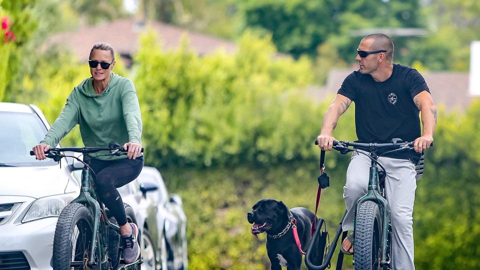 Robin Wright and Clement Giraudet are seen with their dog on June 02, 2020 in Los Angeles, California