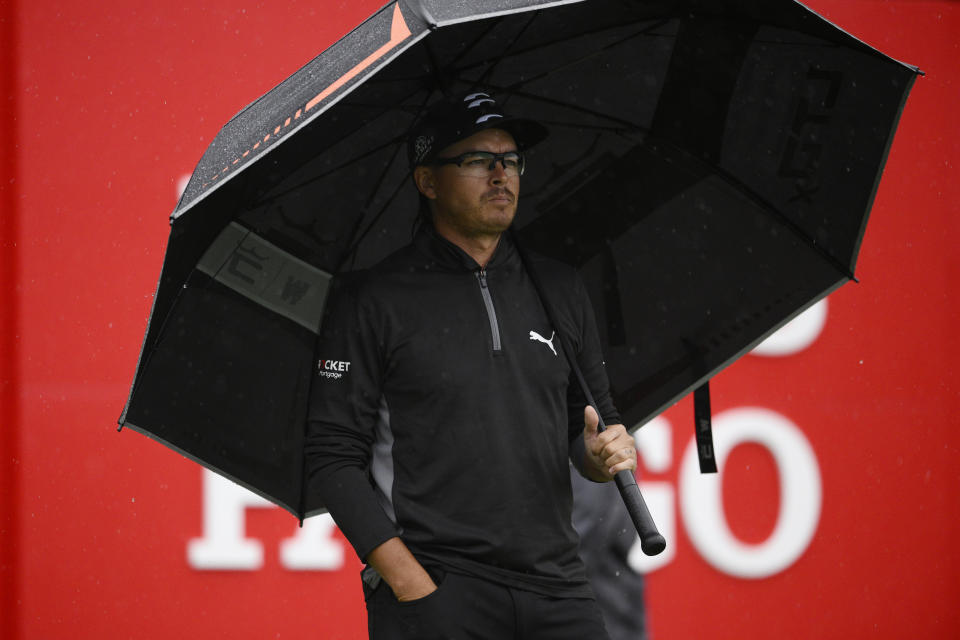 Rickie Fowler waits to hit off the 16th tee during the second round of the Wells Fargo Championship golf tournament, Friday, May 6, 2022, at TPC Potomac at Avenel Farm golf club in Potomac, Md. (AP Photo/Nick Wass)