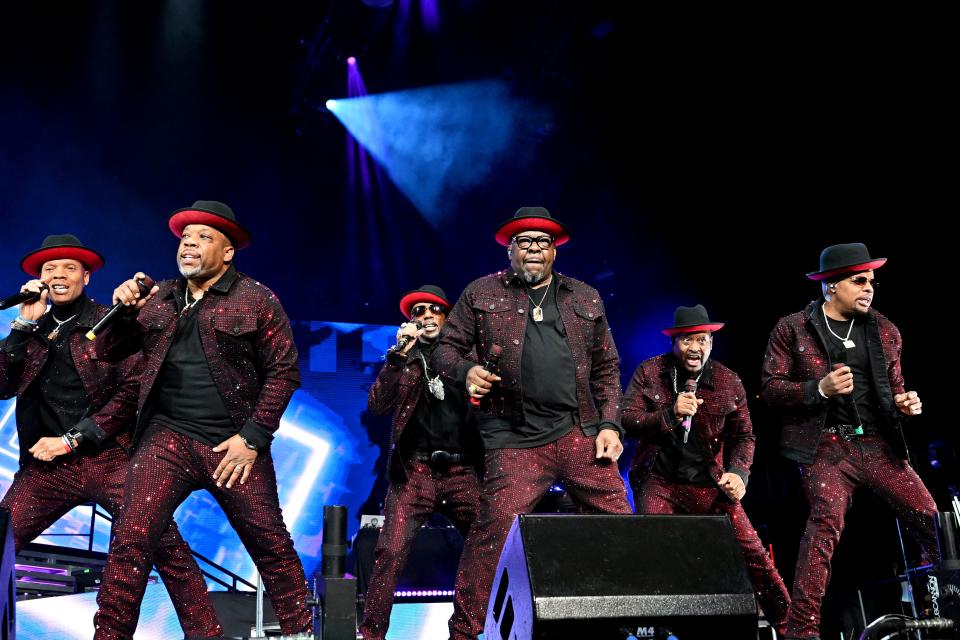 Ronnie DeVoe, Michael Bivins, Ralph Tresvant, Bobby Brown, Johnny Gill, and Ricky Bell of New Edition perform onstage during 2023 New Edition Legacy Tour at State Farm Arena on March 30, 2023 in Atlanta, Georgia