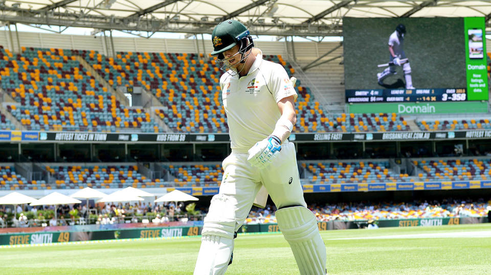 Steve Smith walks off the ground after being dismissed.