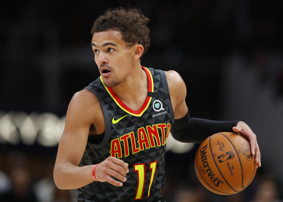 ATLANTA, GA - MARCH 09: Trae Young #11 of the Atlanta Hawks controls the ball during the second half of an NBA game against the Charlotte Hornets at State Farm Arena on March 9, 2020 in Atlanta, Georgia. NOTE TO USER: User expressly acknowledges and agrees that, by downloading and/or using this photograph, user is consenting to the terms and conditions of the Getty Images License Agreement. (Photo by Todd Kirkland/Getty Images)