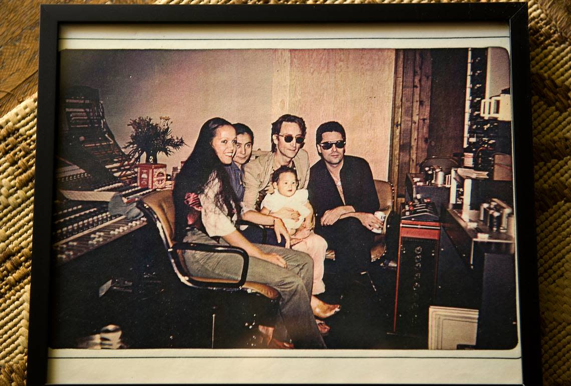 A 1980 photograph shows, from left, Jean Millington, Yoko Ono, John Lennon holding Jean’s daughter Marita, and Earl Slick, who toured with Lennon and is Marita’s father.