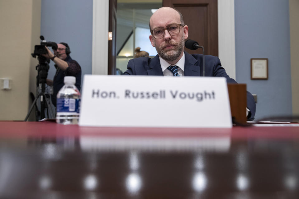 Office of Management and Budget Acting Director Russell Vought arrives to testify during a hearing of the House Budget Committee about President Trump's budget for Fiscal Year 2021, on Capitol Hill, Wednesday, Feb. 12, 2020, in Washington. (AP Photo/Alex Brandon)