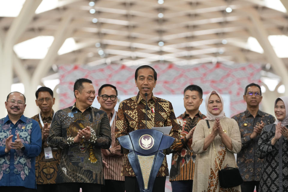 Indonesian President Joko widodo, center, delivers his speech during the opening ceremony for launching Southeast Asia's first high-speed railway at Halim station in Jakarta, Indonesia, Monday, Oct. 2, 2023. Indonesian President Joko Widodo launched Southeast Asia's first high-speed railway that will start its commercial operations on Monday, a key project under China's Belt and Road infrastructure initiative that will cut travel time between two cities from the current three hours to about 40 minutes. (AP Photo/Achmad Ibrahim)