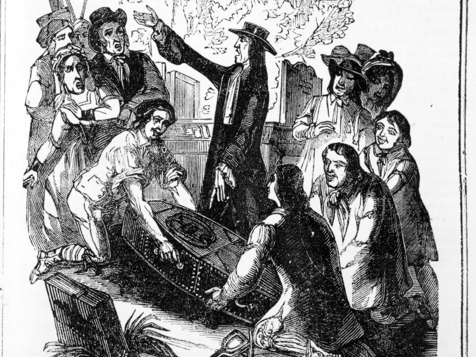 An illustration of several people digging up a coffin