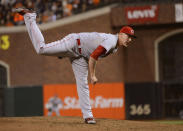 Mat Latos #55 of the Cincinnati Reds pitches in the fourth inning against the San Francisco Giants in Game One of the National League Division Series at AT&T Park on October 6, 2012 in San Francisco, California. (Photo by Thearon W. Henderson/Getty Images)