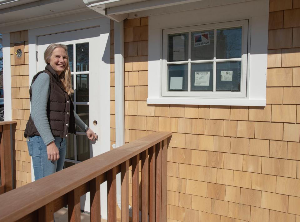 Jessica Devin heads into the new addition to Brewster Book Store along Route 6A. The new space will give the popular store two accessible entrances and also much needed extra space to display their wide variety of titles.