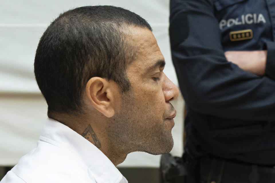Brazilian soccer star Dani Alves sits during his trial in Barcelona, Spain, Monday, Feb. 5, 2024. Dani Alves goes on trial Monday a year after he allegedly sexually assaulted a young woman at a Barcelona nightclub. The 40-year-old Alves is accused of sexually assaulting the woman on the night of Dec. 30, 2022. He denies any wrongdoing. (D.Zorrakino/Pool Photo via AP)