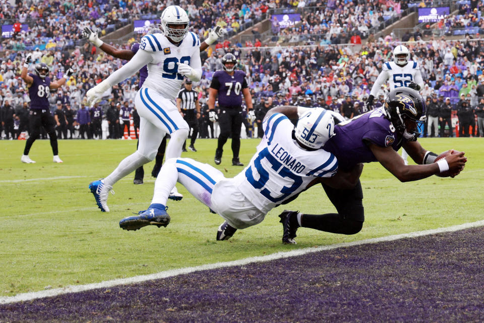 BALTIMORE, MARYLAND – SEPTEMBER 24: Lamar Jackson #8 of the <a class="link " href="https://sports.yahoo.com/nfl/teams/baltimore/" data-i13n="sec:content-canvas;subsec:anchor_text;elm:context_link" data-ylk="slk:Baltimore Ravens;sec:content-canvas;subsec:anchor_text;elm:context_link;itc:0">Baltimore Ravens</a> scores a touchdown as <a class="link " href="https://sports.yahoo.com/nfl/players/31006" data-i13n="sec:content-canvas;subsec:anchor_text;elm:context_link" data-ylk="slk:Shaquille Leonard;sec:content-canvas;subsec:anchor_text;elm:context_link;itc:0">Shaquille Leonard</a> #53 of the <a class="link " href="https://sports.yahoo.com/nfl/teams/indianapolis/" data-i13n="sec:content-canvas;subsec:anchor_text;elm:context_link" data-ylk="slk:Indianapolis Colts;sec:content-canvas;subsec:anchor_text;elm:context_link;itc:0">Indianapolis Colts</a> tackles Jackson in the first quarter at M&T Bank Stadium on September 24, 2023 in Baltimore, Maryland. (Photo by Rob Carr/Getty Images)