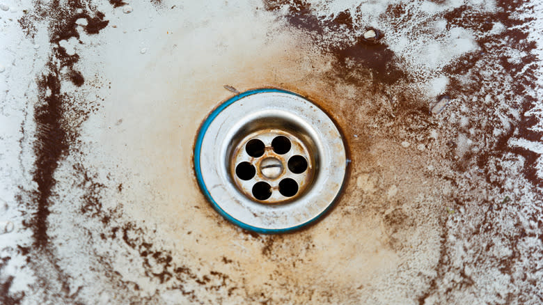 Rust stains around kitchen sink drain
