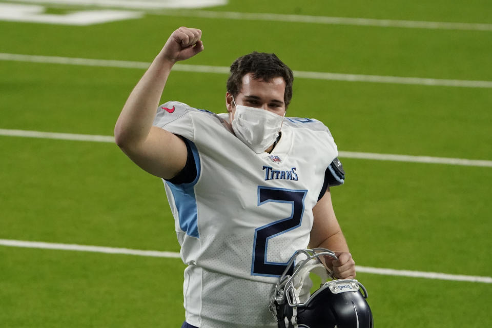 Tennessee Titans kicker Sam Sloman celebrates after an NFL football game against the Houston Texans Sunday, Jan. 3, 2021, in Houston. Sloman kicked the game-winning field goal in the Titans 41-38 win over the Texans. (AP Photo/Sam Craft)