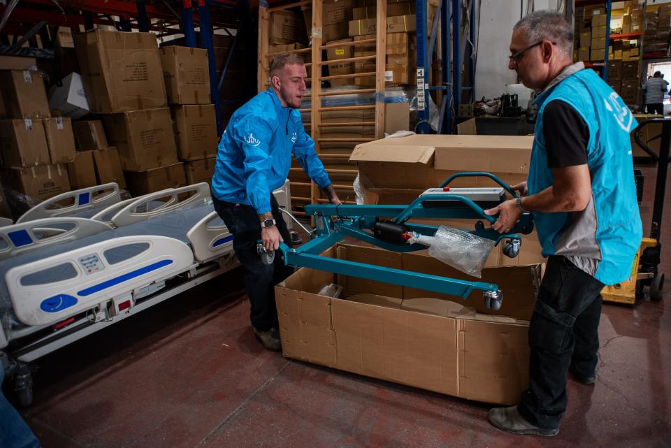 JDC workers at a warehouse in Modi’in, Israel, prepare medical equipment for distribution to facilities where disabled and elderly Israelis fled after the Oct. 7 massacres, part of the organization's emergency response efforts focused on the most vulnerable Israelis.