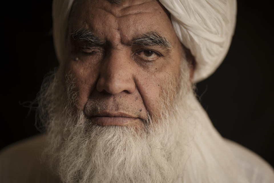 Taliban leader Mullah Nooruddin Turabi poses for a photo in Kabul, Afghanistan, on Sept. 22, 2021. Mullah Turabi, one of the founders of the Taliban, says the hard-line movement will once again carry out punishments like executions and amputations of hands, though perhaps not in public. (AP Photo/Felipe Dana)