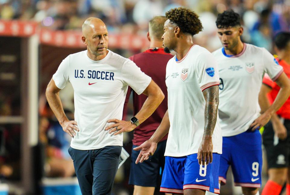 Jul 1, 2024; Kansas City, Missouri, USA; United States head coach Gregg Berhalter talks with midfielder Weston McKennie (8) during the second half of a Copa America match against Uruguay at Arrowhead Stadium. Mandatory Credit: Jay Biggerstaff-USA TODAY Sports