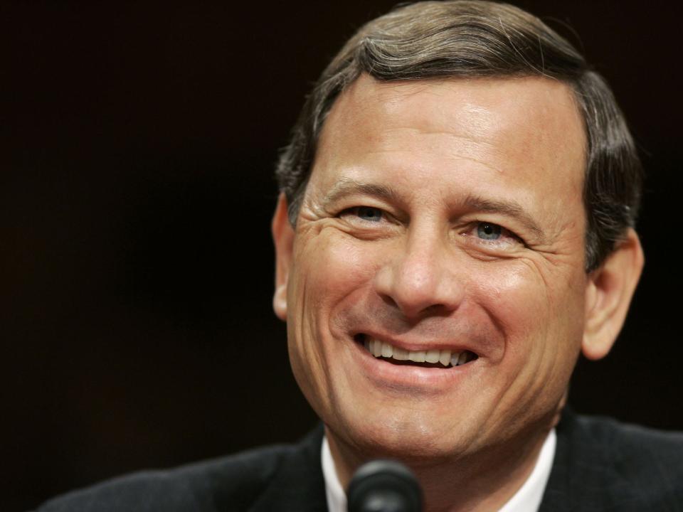 Chief Justice nominee John Roberts smiles while testifying on Capitol Hill, Thursday, Sept. 15, 2005.