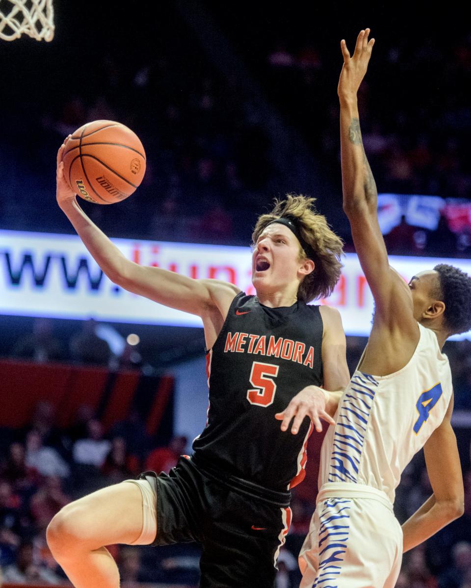 Metamora's Matthew Zobrist, left, plays in the Class 3A state finals in 2022. Zobrist on Tuesday committed to play college basketball at Bradley, following in his father's footsteps.