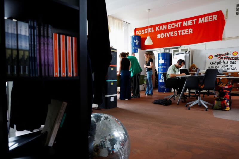 Campaign leader Hiske Arts speaks during a meeting of climate group Fossielvrij Nederland (Fossil Free Netherlands) in Amsterdam