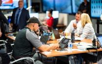 A York Regional Police officer makes a phone call during an illegal gaming investigation named Project Sindacato in Vaughan