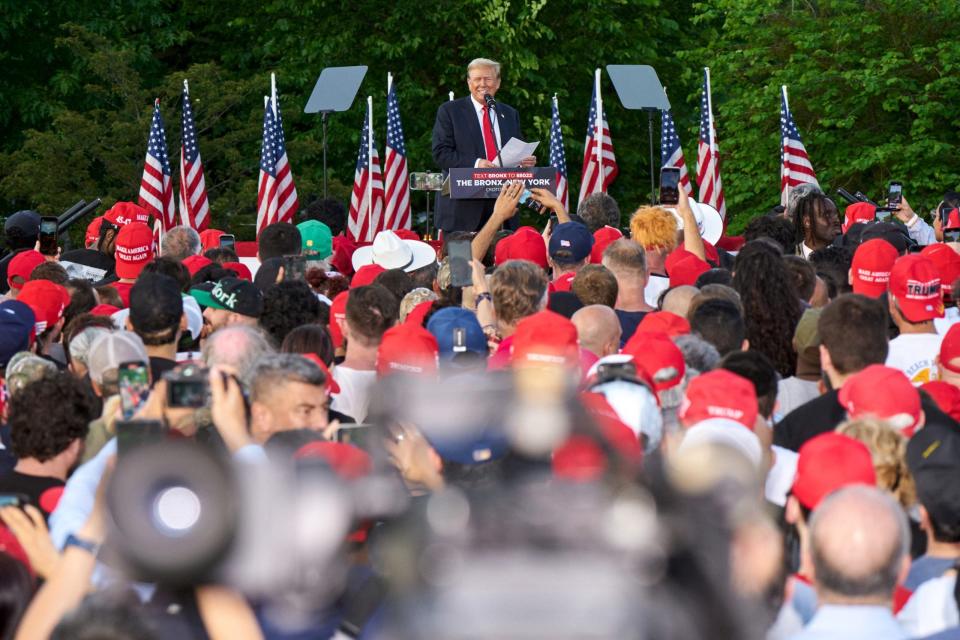 Former President Donald Trump, center, during a campaign event at Crotona Park in the Bronx borough of New York, US, on Thursday, May 23, 2024. Photographer: Bing Guan/Bloomberg via Getty Images