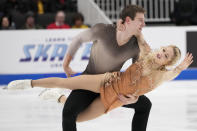 Brandon Frazier, top, and Alexa Knierim perform during the pairs free skate at the U.S. figure skating championships in San Jose, Calif., Saturday, Jan. 28, 2023. (AP Photo/Tony Avelar)