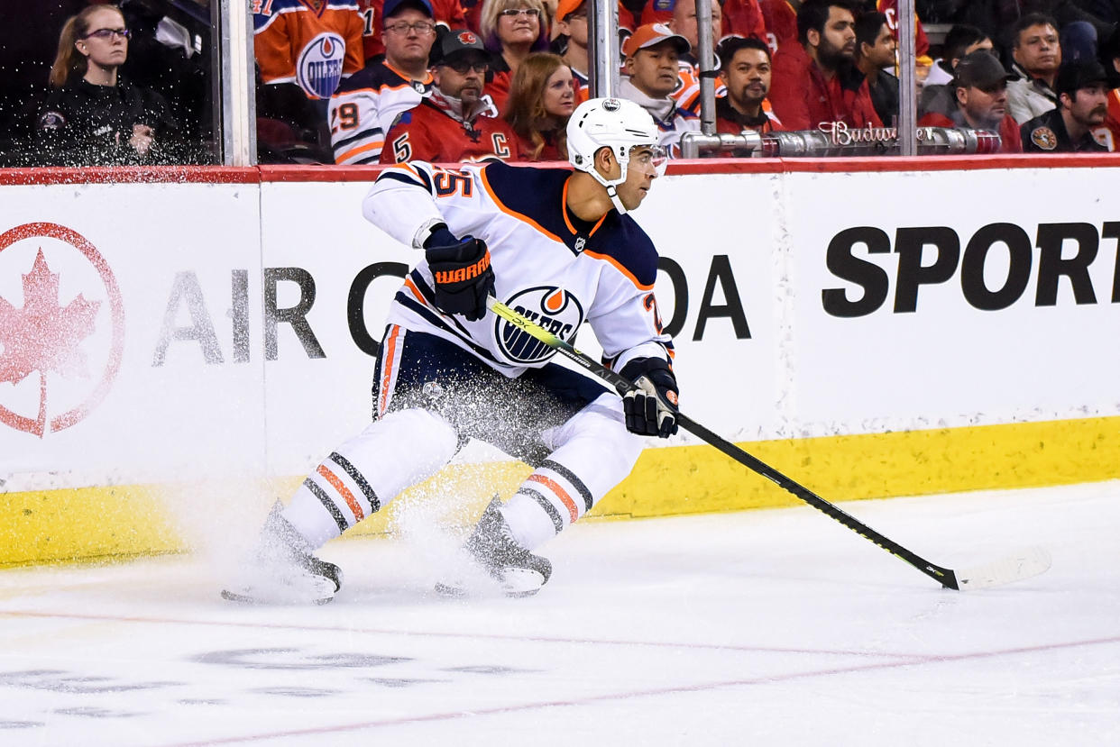 CALGARY, AB - JANUARY 11: Edmonton Oilers Defenceman Darnell Nurse (25) skates with the puck in his zone during the second period of an NHL game where the Calgary Flames hosted the Edmonton Oilers on January 11, 2020, at the Scotiabank Saddledome in Calgary, AB. (Photo by Brett Holmes/Icon Sportswire via Getty Images)