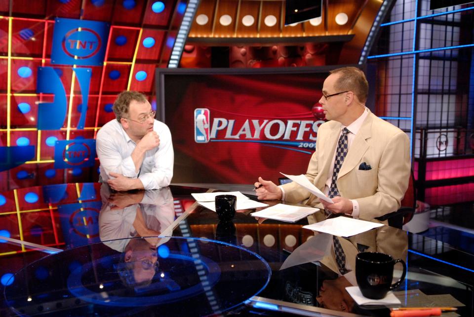 Producer Tim Kiely, left, talks with Ernie Johnson before &quot;NBA on TNT&quot; on May 2, 2007, in Atlanta.