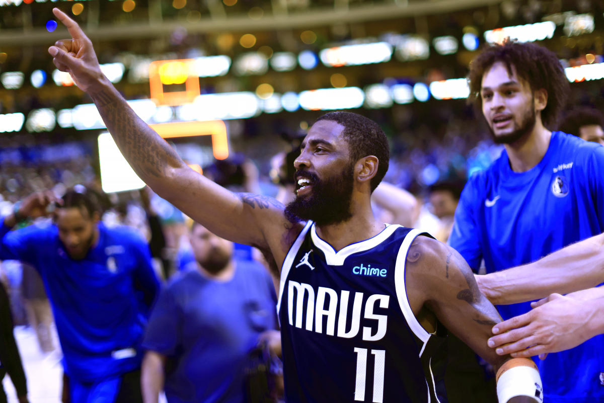 Kyrie Irving hits a left-hander at the buzzer to lift the Mavericks past the Nuggets