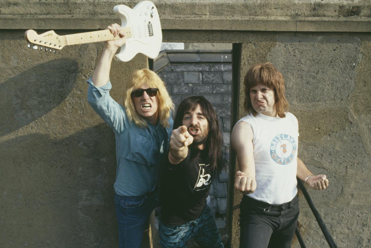 Parody English heavy metal band, Spinal Tap starring Michael McKean (David St. Hubbins), Harry Shearer (Derek Smalls), and Christopher Guest (Nigel Tufnel)