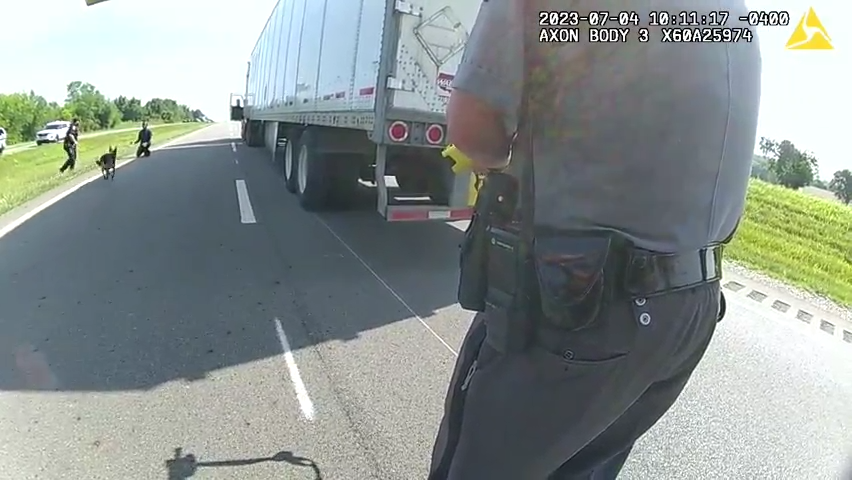 WARNING: Video contains graphic content. Bodycam footage shows the scenes that led up to a semi-truck driver being bit by a Circleville police K9 dog during a traffic pursuit arrest on July 4, 2023.