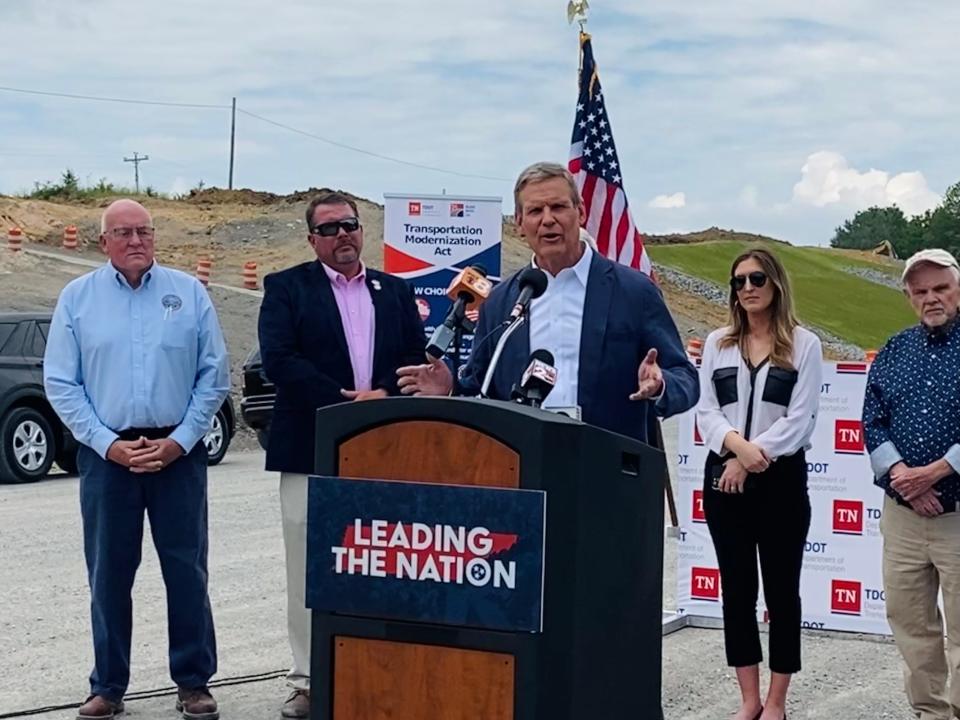 Tennessee Gov. Bill Lee touts his $3.3 billion Transportation Modernization Act in Clarkrange, Tennessee on Thursday. At the news conference, Lee said he would keep pushing for his proposal to allow courts to order the temporary removal of guns from those deemed a danger to themselves or others.