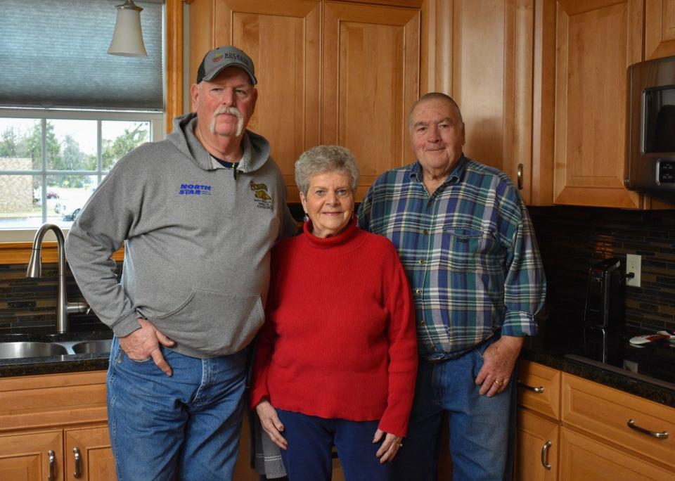 Pat Mowry, center, was named an Outstanding Fair Supporter by Gov. Mike DeWine at the 98th Ohio Fair Managers Association annual convention on Jan. 13. She was able to accomplish much during her 18 years on the Sandusky County Fair Board because of help from Fair Board President Harold Overmyer, left, and Pat’s husband, Charles Mowry, right.