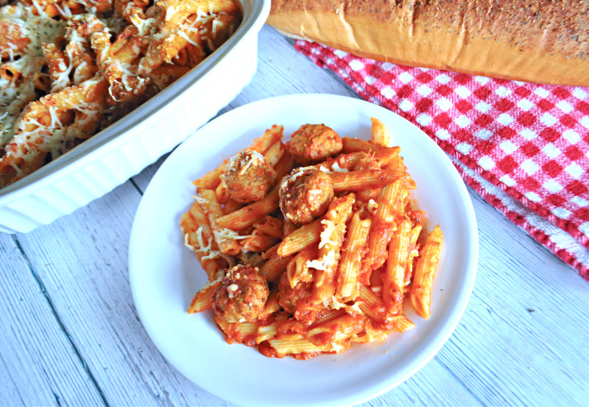 <p>Krista Marshall</p><p>There are so many things you can make with a bag of <a href="https://parade.com/1011830/saraholson/easy-frozen-meatball-crockpot-recipes/" rel="nofollow noopener" target="_blank" data-ylk="slk:frozen meatballs;elm:context_link;itc:0;sec:content-canvas" class="link rapid-noclick-resp">frozen meatballs</a>, but this Meatball Pasta Bake is a genius place to start.</p><p><strong>Get the recipe: <a href="/1243693/kristamarshall/easy-meatball-pasta-bake/" data-ylk="slk:Easy Meatball Penne Pasta Bake;elm:context_link;itc:0;sec:content-canvas" class="link rapid-noclick-resp">Easy Meatball Penne Pasta Bake</a></strong></p>