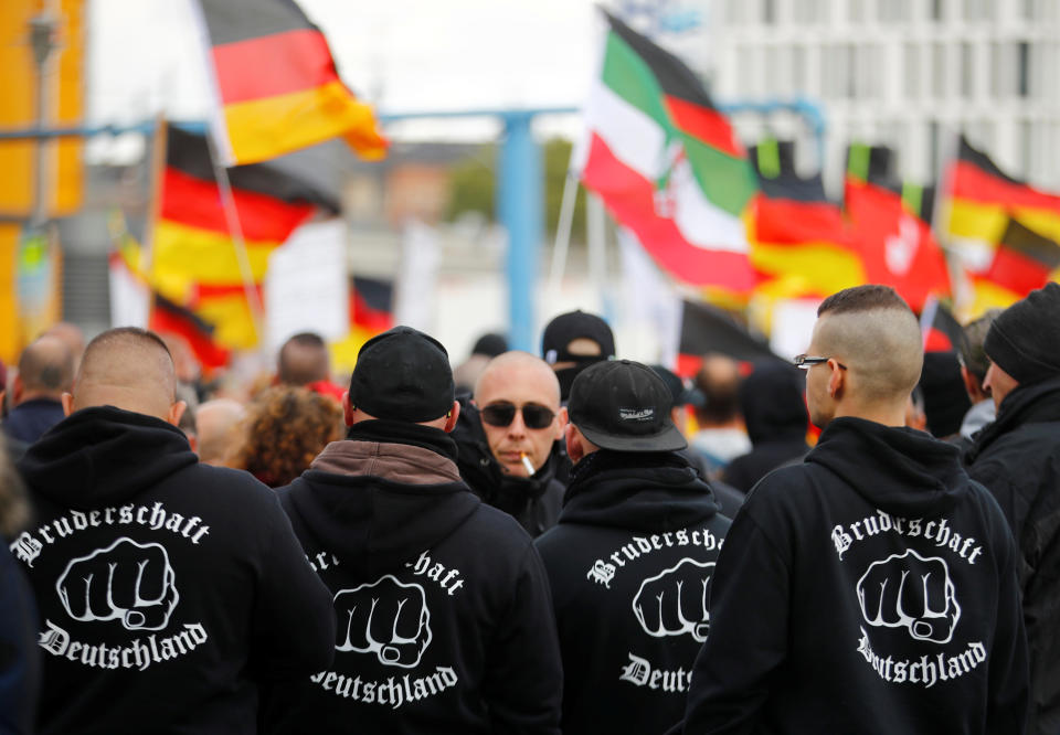 People attend a far-right wing demonstration in Berlin, Germany, October 3, 2019. The hoodies read "Brotherhood Germany." REUTERS/Hannibal Hanschke