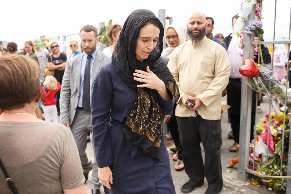 Prime Minister Jacinda Ardern, center, leaves after a visit to the Kilbirnie Mosque in Wellington, New Zealand, on March 17, 2019.