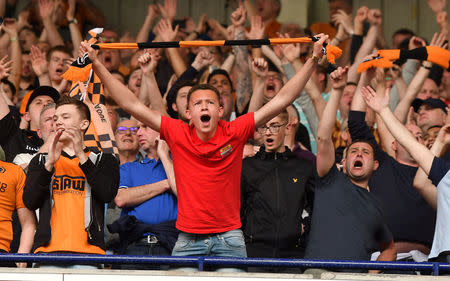 Soccer Football - Championship - Bolton Wanderers v Wolverhampton Wanderers - Macron Stadium, Bolton, Britain - April 21, 2018 Wolverhampton Wanderers fans celebrate winning the Championship Action Images/Paul Burrows