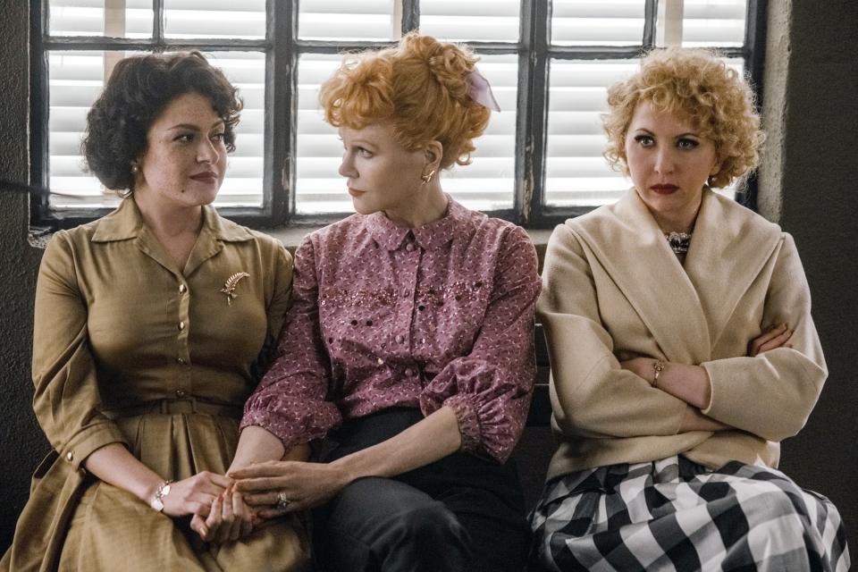 Alia Shawkat, Nicole Kidman, and Nina Arianda sit together on a bench