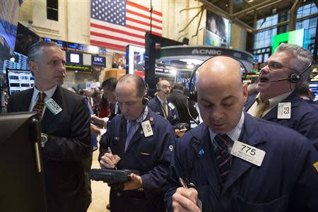 Traders work on the floor of the New York Stock Exchange April 3, 2014. REUTERS/Brendan McDermid