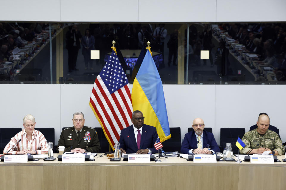 From left, U.S. Assistant Secretary of Defense for International Security Affairs Celeste A. Wallander, U.S. Chairman of the Joint Chiefs of Staff, General Mark Milley, U.S. Defense Secretary Lloyd Austin, Ukraine's Defense Minister Oleksii Reznikov and Ukrainian Lieutenant General Levgen Moisuk attend the Ukraine Defense Contact group meeting ahead of a NATO defense ministers' meeting at NATO headquarters in Brussels, Wednesday, June 15, 2022. NATO defense ministers, attending a two-day meeting starting Wednesday, will discuss beefing up weapons supplies to Ukraine, and Sweden and Finland's applications to join the transatlantic military alliance. (Yves Herman, Pool Photo via AP)