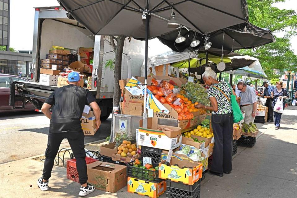 City grocery-store owners are blasting Big Apple officials for allowing licensed fruit and vegetable vendors on the same block as their shops. Gregory P. Mango
