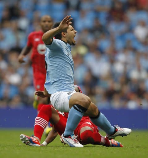 Manchester City's Sergio Aguero (R) is seen being injured as Southampton's Nathaniel Clyne tackles him during their English Premier League match at the City of Manchester Stadium in Manchester, on August 19. Man City will hope to welcome Aguero for the tricky trip to an always obdurate Stoke on Saturday