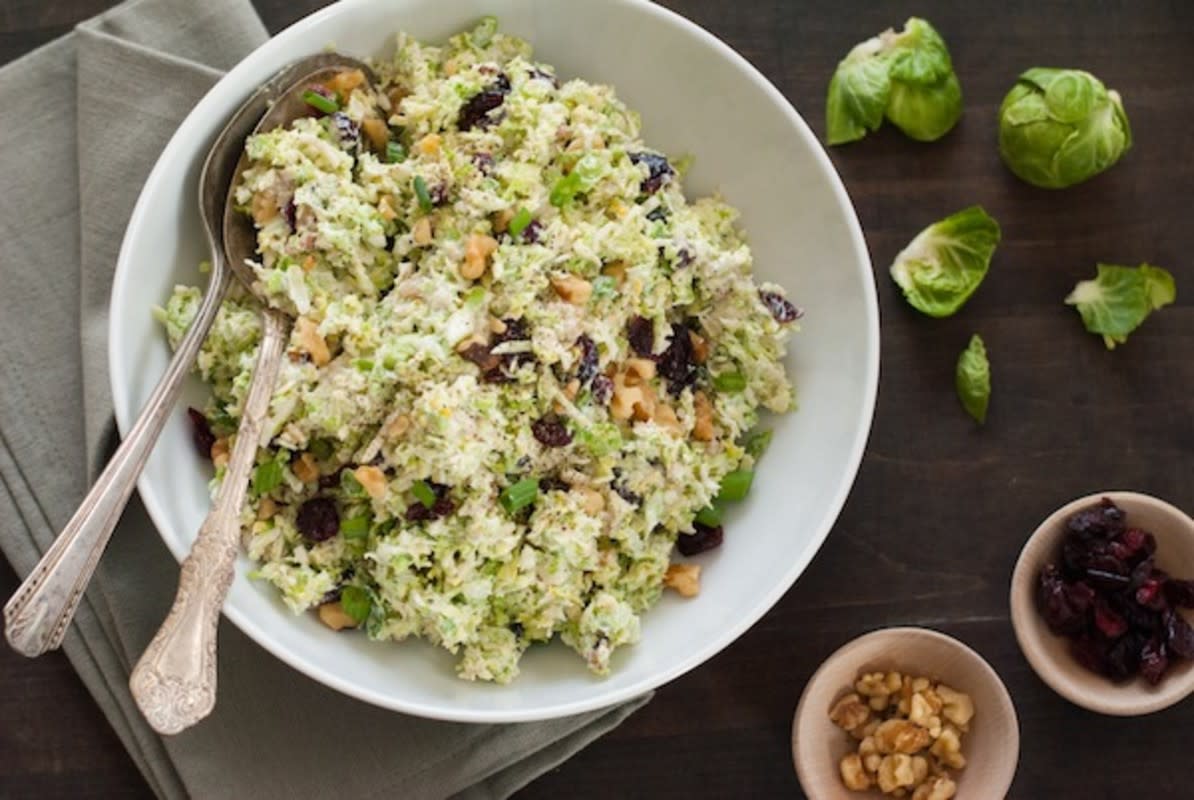 <p>Foxes Love Lemons</p><p>Fruit & Nut Brussels Sprouts Slaw is a perfectly light, green and fresh dish to break up all the heavy food on the plate. <a href="http://foxeslovelemons.com/fruit-nut-brussels-sprout-slaw/" rel="nofollow noopener" target="_blank" data-ylk="slk:Get the recipe here.;elm:context_link;itc:0;sec:content-canvas" class="link rapid-noclick-resp">Get the recipe here.</a></p>
